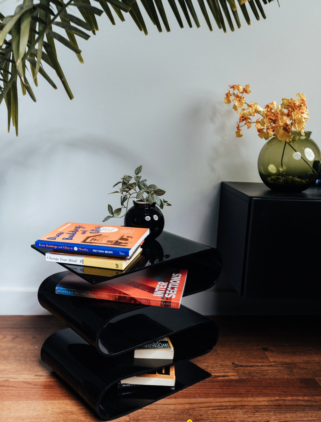 Wobble Black Acrylic End Table & Magazine Storage